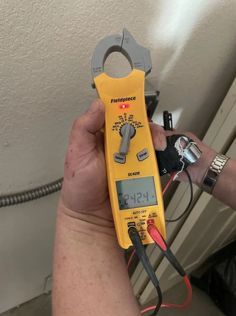 Voltage testing with clamp meter during Circuit Breaker Repair in East Hanover